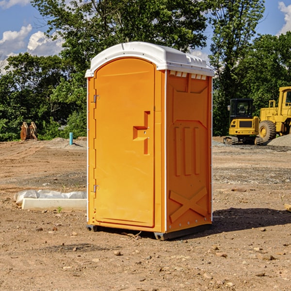 how often are the portable restrooms cleaned and serviced during a rental period in Lowland North Carolina